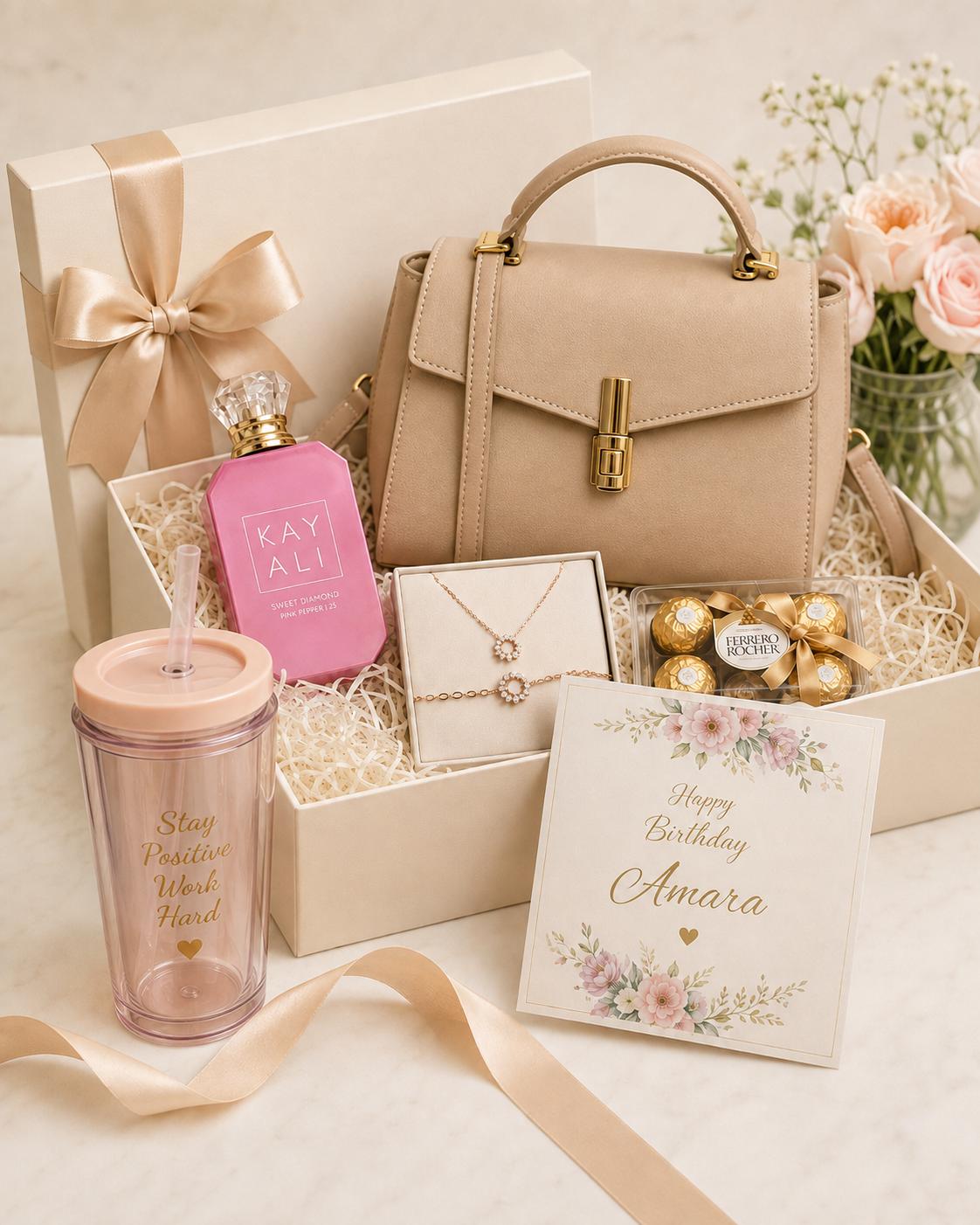 Order a gift set for her with a fashion handbag, Kaly perfume, bracelet and necklace, chocolates, personalised card, decor box and sippy cup from Trelluna in Lagos.