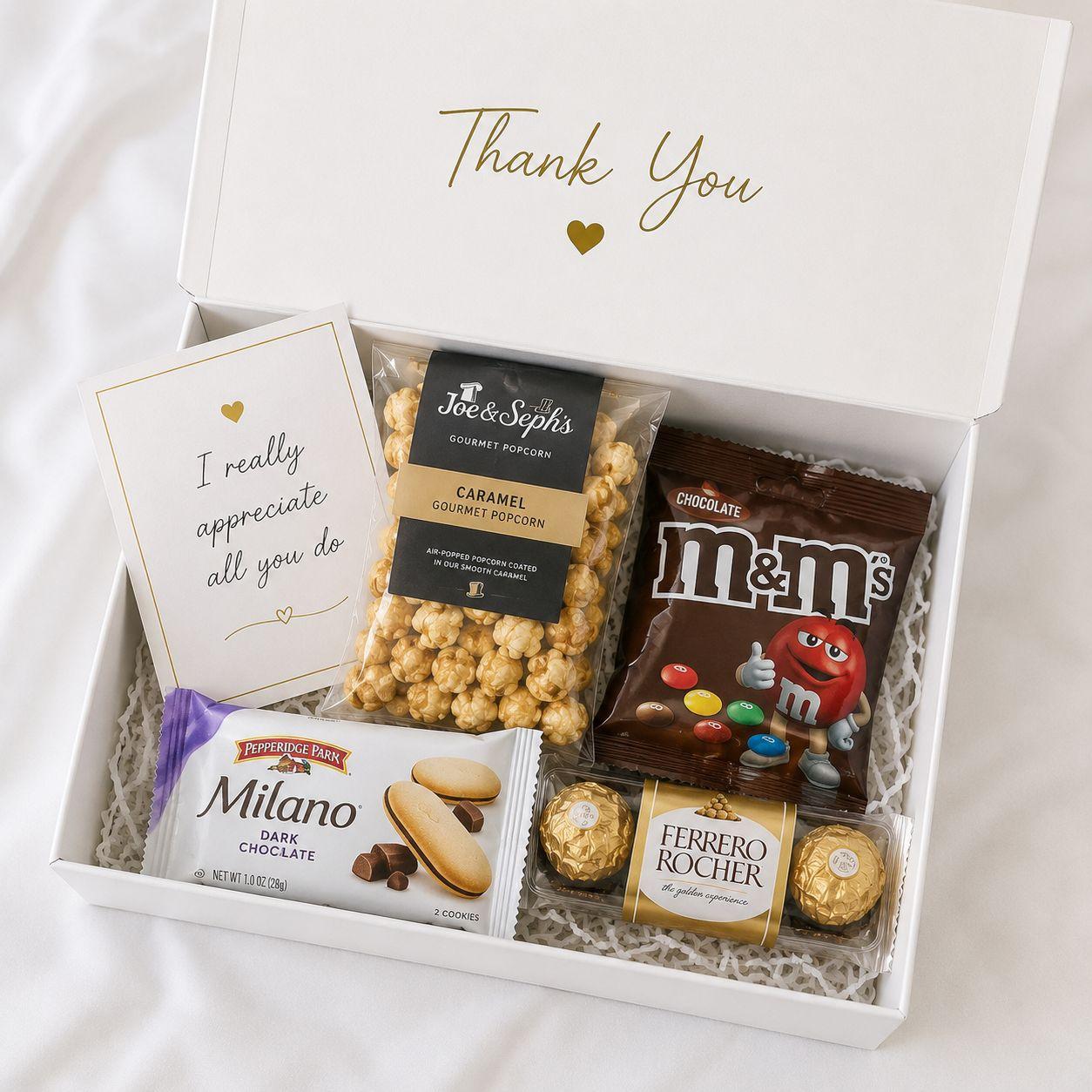 Mini treat box with popcorn, chocolate and card