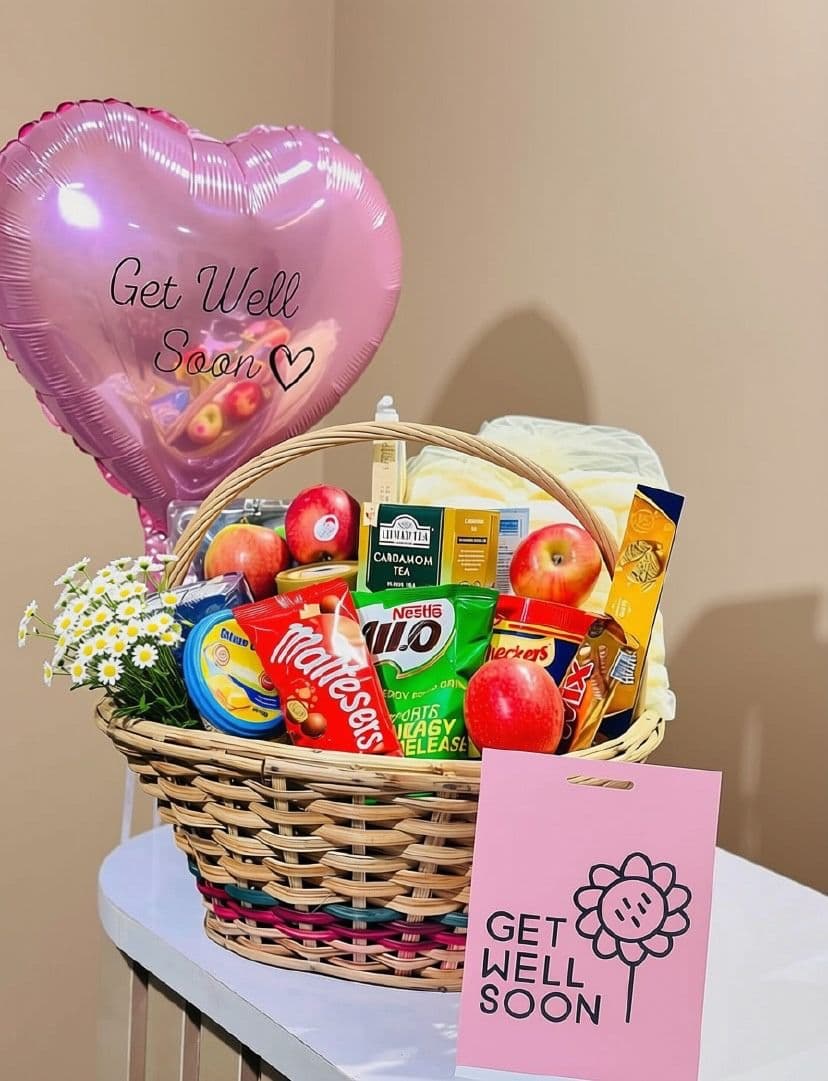 Get-well gift with fluffy towel, fruits, provisions, customized card and heart-shaped deluxe balloon