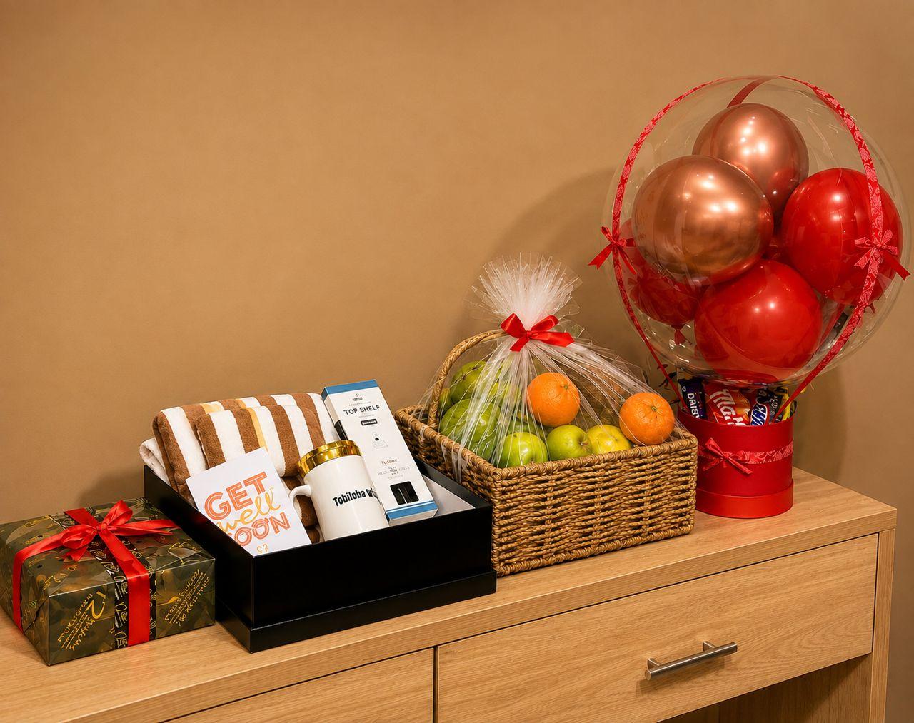 Gift set with fruit box, hot air balloon treat, self-care box, fluffy towel, customized mirror mug, diffuser and card