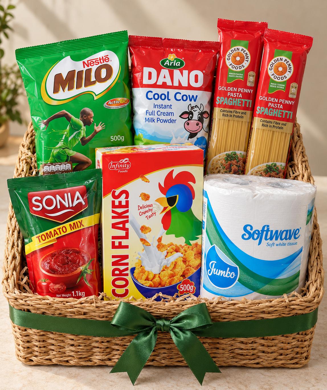 Christmas hamper basket with Milo refill, Dano milk refill, Golden Penny spaghetti, Sonia tomato, corn flakes and toilet paper